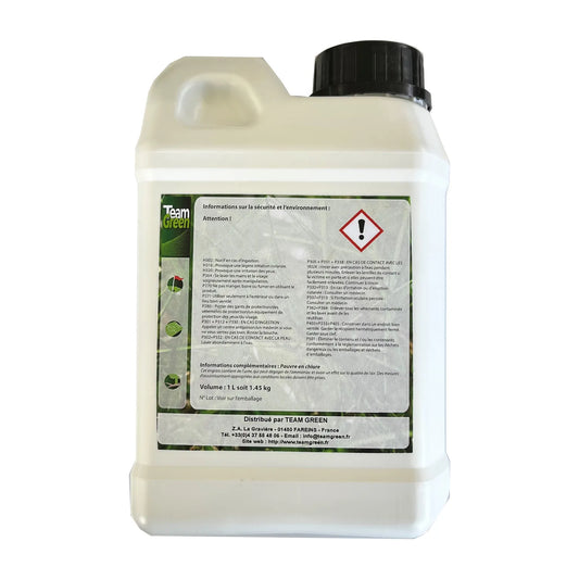 L'arrière du bidon Team-Iron, montrant des informations sur la sécurité, des précautions d'utilisation et un pictogramme de danger (triangle rouge avec un point d'exclamation). Le texte mentionne les instructions en cas de contact ou d'ingestion et des conseils de stockage.