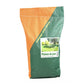 Un grand sac de semences Les Gazons de France avec l’étiquette "Plaines de jeux". Le sac vert et orange présente une image d’une pelouse verdoyante sous des arbres, idéale pour les zones de jeux.